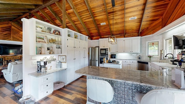 8875 E State Highway 52, Webb, AL 36376 - kitchen featuring stainless steel appliances, wood ceiling, open shelves, dark wood finished floors, and light stone counters
