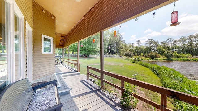 8875 E State Highway 52, Webb, AL 36376 - wooden deck featuring a water view, a yard, and view of scattered trees