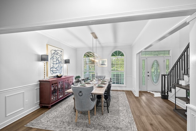 856 S County Rd 49, Dothan, AL 36301 - dining space with wood finished floors, ornamental molding, wainscoting, and stairs