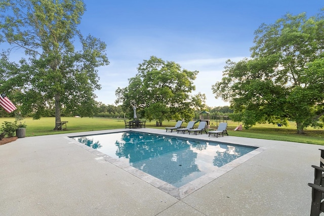 856 S County Rd 49, Dothan, AL 36301 - swimming pool featuring a patio and a yard