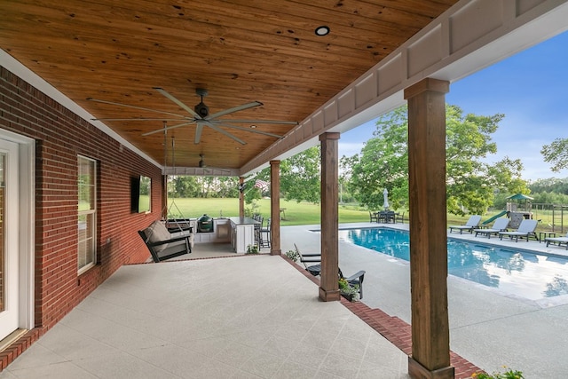 856 S County Rd 49, Dothan, AL 36301 - view of patio / terrace with a ceiling fan and an outdoor pool