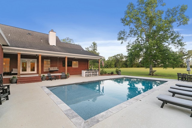 856 S County Rd 49, Dothan, AL 36301 - outdoor pool with a patio, a lawn, and french doors