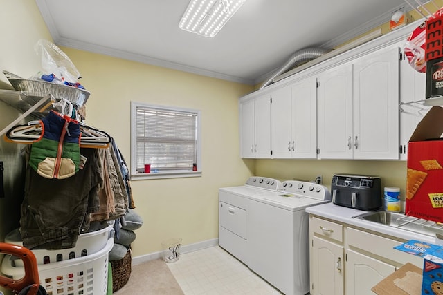 856 S County Rd 49, Dothan, AL 36301 - clothes washing area with washer and dryer, cabinet space, ornamental molding, light flooring, and baseboards