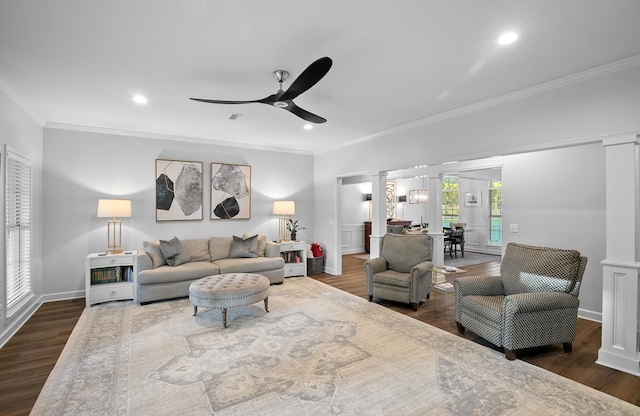 856 S County Rd 49, Dothan, AL 36301 - living area featuring decorative columns, dark wood-style flooring, a ceiling fan, ornamental molding, and recessed lighting