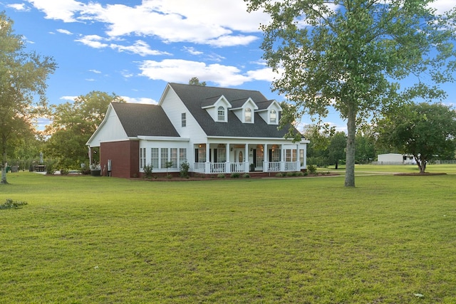 856 S County Rd 49, Dothan, AL 36301 - cape cod house with a porch, a front lawn, and roof with shingles