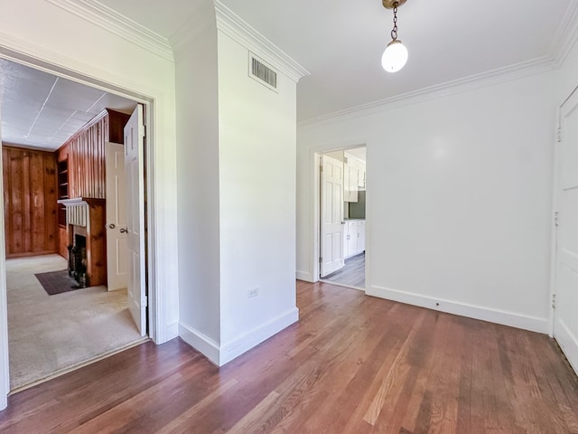 800 W Brookside Ave, Geneva, AL 36340 - hallway featuring wood finished floors and ornamental molding