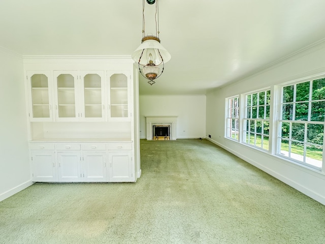 800 W Brookside Ave, Geneva, AL 36340 - unfurnished living room with light colored carpet, ornamental molding, a fireplace, and a chandelier