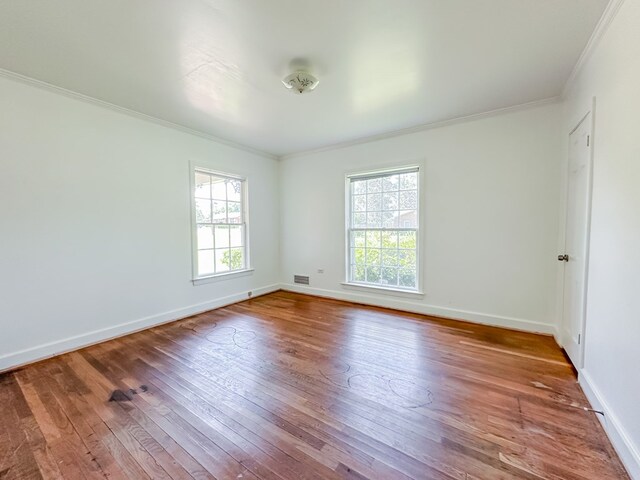 800 W Brookside Ave, Geneva, AL 36340 - spare room with ornamental molding and hardwood / wood-style flooring