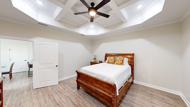 bedroom featuring coffered ceiling, ceiling fan, ornamental molding, beam ceiling, and wood-type flooring