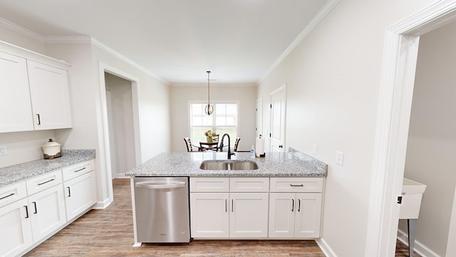 kitchen with crown molding, sink, dishwasher, light hardwood / wood-style floors, and white cabinetry