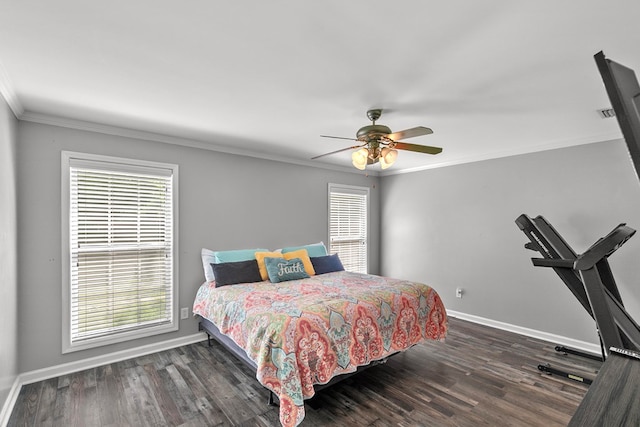 404 Powder Horn Dr, Midland City, AL 36350 - bedroom featuring baseboards, crown molding, wood finished floors, and multiple windows
