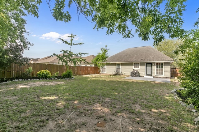 404 Powder Horn Dr, Midland City, AL 36350 - back of house with a yard, a patio area, and a fenced backyard