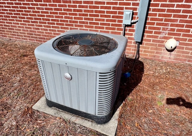 details with brick siding and central air condition unit