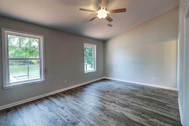 1272 Otho Rd, Abbeville, AL 36310 - spare room featuring a ceiling fan, lofted ceiling, and dark wood-style flooring