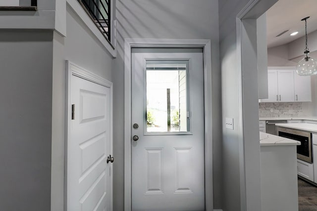 1272 Otho Rd, Abbeville, AL 36310 - doorway to outside featuring dark wood-style floors