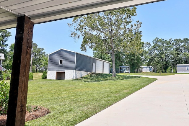 1272 Otho Rd, Abbeville, AL 36310 - view of home's exterior with a yard and a garage