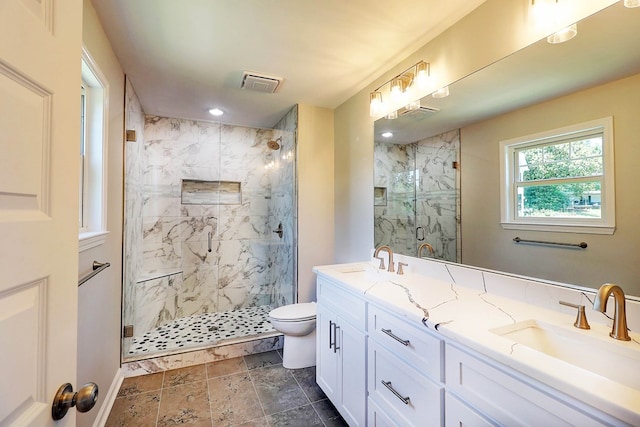 1272 Otho Rd, Abbeville, AL 36310 - bathroom with a marble finish shower, double vanity, and recessed lighting