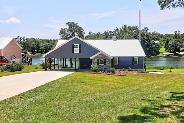 1272 Otho Rd, Abbeville, AL 36310 - view of front of property featuring a water view, driveway, and a front lawn