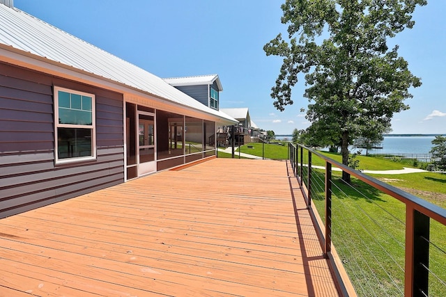 1272 Otho Rd, Abbeville, AL 36310 - wooden deck with a water view, a sunroom, and a lawn