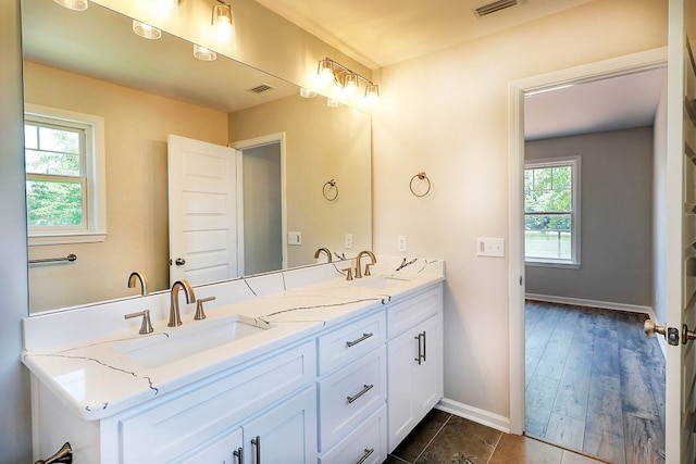 1272 Otho Rd, Abbeville, AL 36310 - full bathroom featuring double vanity and tile patterned floors