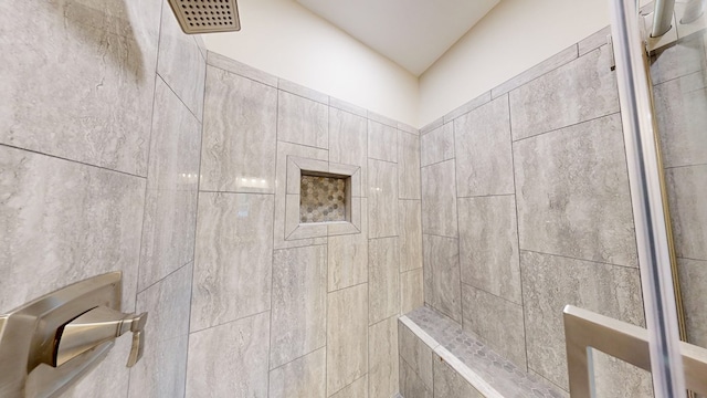 room details with a tile shower