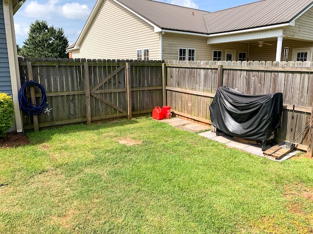 202 Moonlight Ln, Midland City, AL 36350 - fenced backyard with a ceiling fan
