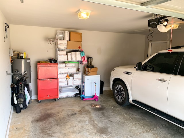 202 Moonlight Ln, Midland City, AL 36350 - garage featuring water heater and a garage door opener