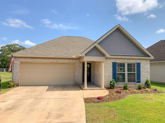 202 Moonlight Ln, Midland City, AL 36350 - view of front of home with an attached garage, driveway, and a front lawn