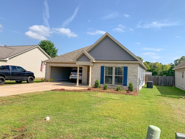 202 Moonlight Ln, Midland City, AL 36350 - view of front of property with brick siding, driveway, and a garage