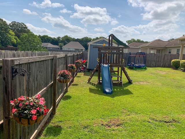 202 Moonlight Ln, Midland City, AL 36350 - view of play area with a fenced backyard and a trampoline
