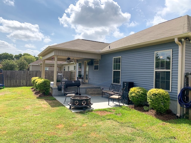 202 Moonlight Ln, Midland City, AL 36350 - back of house featuring a fire pit, a patio area, and ceiling fan