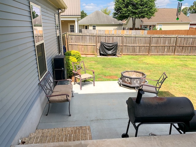 202 Moonlight Ln, Midland City, AL 36350 - view of patio with an outdoor fire pit