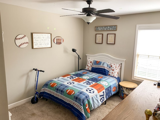 202 Moonlight Ln, Midland City, AL 36350 - carpeted bedroom with a ceiling fan and baseboards