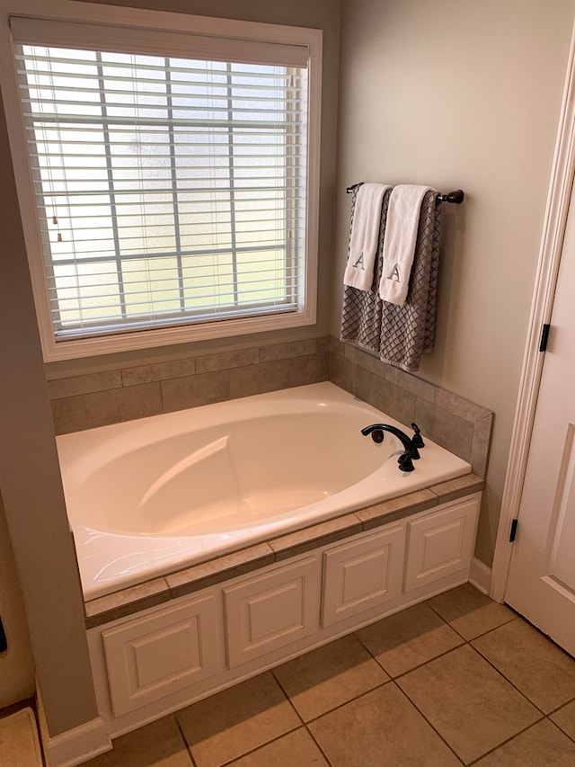 202 Moonlight Ln, Midland City, AL 36350 - bathroom featuring a bath and tile patterned floors