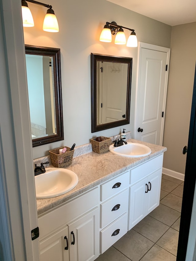 202 Moonlight Ln, Midland City, AL 36350 - full bath with double vanity and tile patterned flooring