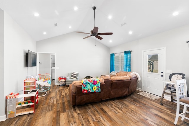 living area with lofted ceiling, wood finished floors, visible vents, and recessed lighting