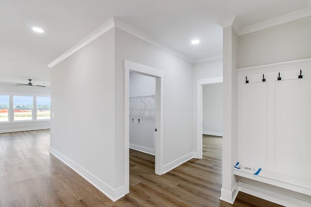 bathroom with wood-type flooring, vanity, and walk in shower