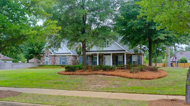 view of front of home with a front yard