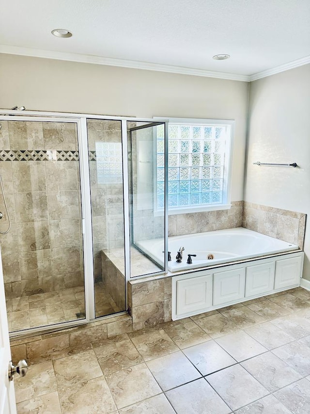 bathroom with crown molding and plus walk in shower