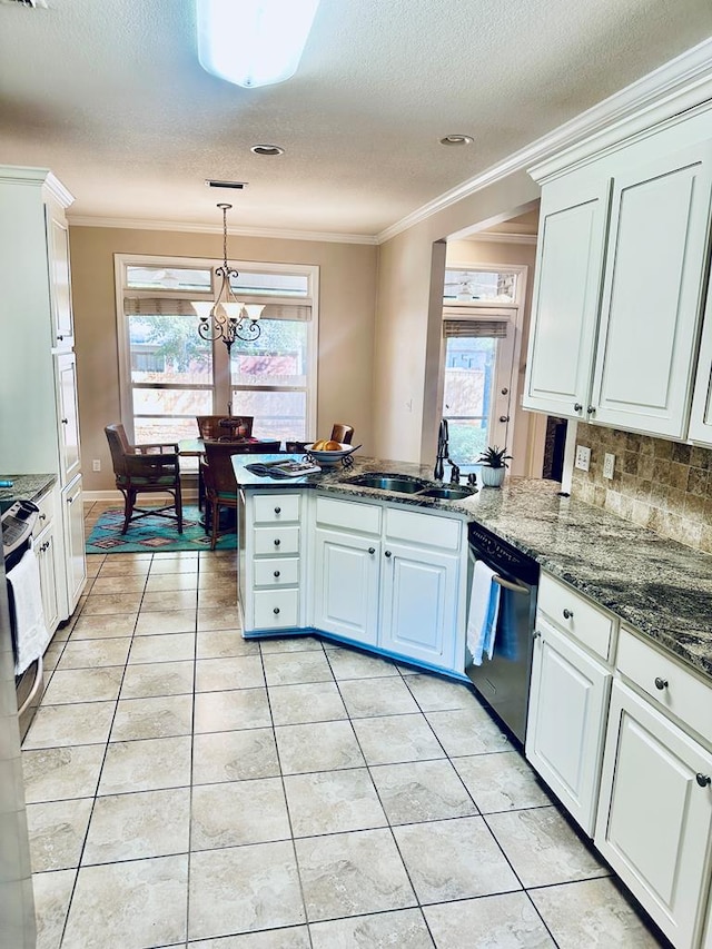 kitchen with sink, white cabinetry, light tile patterned flooring, kitchen peninsula, and appliances with stainless steel finishes