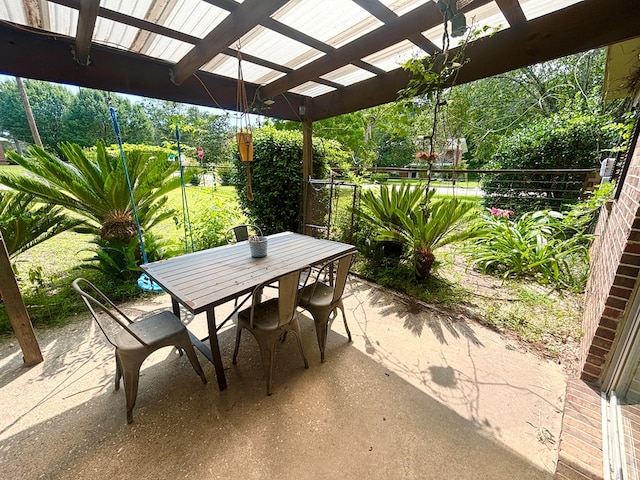 2203 Stonebridge Rd, Dothan, AL 36301 - view of patio featuring outdoor dining space and a pergola