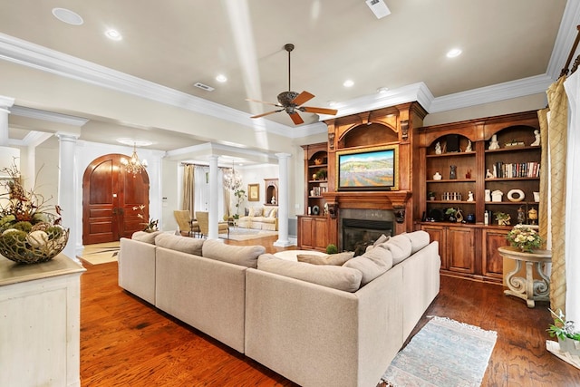 203 Liveoak Trl, Dothan, AL 36305 - living room featuring ornate columns, crown molding, ceiling fan, a glass covered fireplace, and recessed lighting