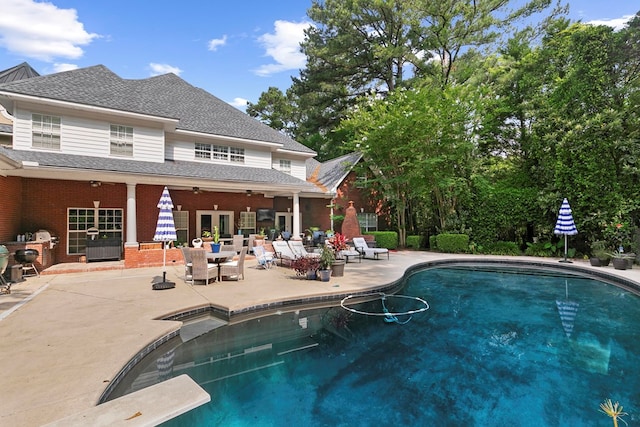 203 Liveoak Trl, Dothan, AL 36305 - outdoor pool with a patio, ceiling fan, french doors, and a diving board