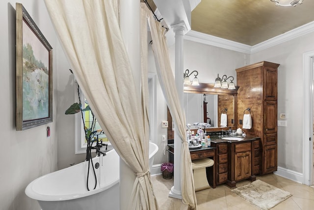 203 Liveoak Trl, Dothan, AL 36305 - full bathroom featuring vanity, ornamental molding, a soaking tub, tile patterned flooring, and baseboards