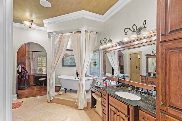 203 Liveoak Trl, Dothan, AL 36305 - full bathroom with tile patterned flooring, ornamental molding, vanity, a freestanding tub, and a shower