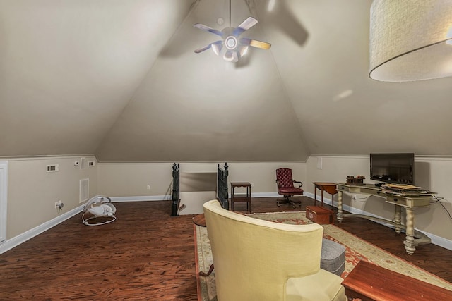 203 Liveoak Trl, Dothan, AL 36305 - living area featuring wood finished floors, vaulted ceiling, ceiling fan, and baseboards