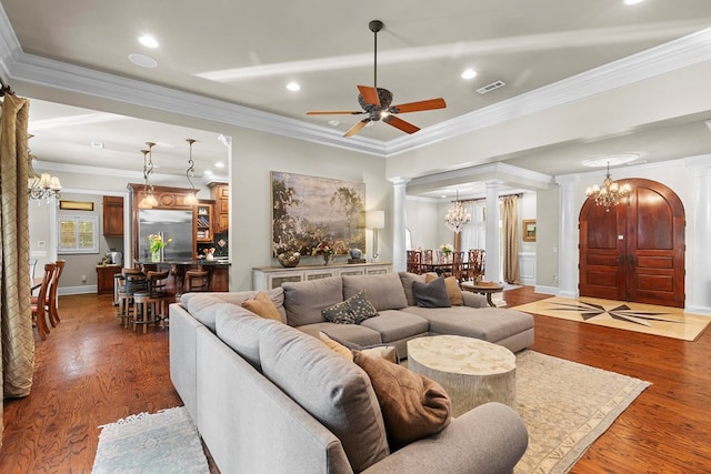 203 Liveoak Trl, Dothan, AL 36305 - living room with ornate columns, a chandelier, crown molding, a ceiling fan, and recessed lighting