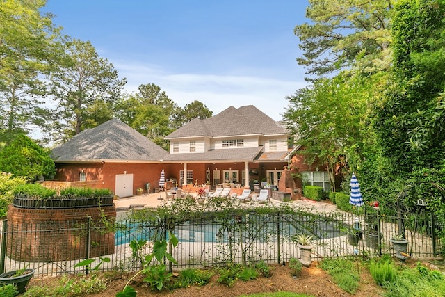 203 Liveoak Trl, Dothan, AL 36305 - back of property featuring a patio, french doors, and brick siding