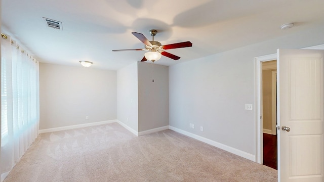 174 Ridgecrest Loop, Dothan, AL 36301 - unfurnished room with light carpet, a ceiling fan, a smoke detector, and baseboards