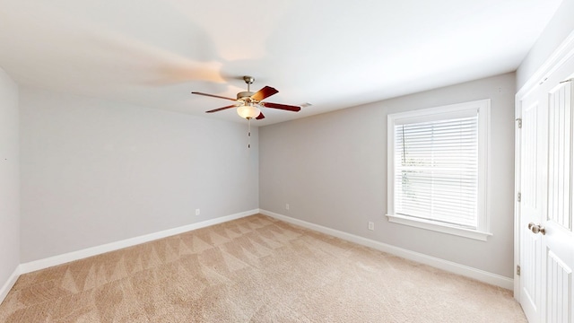 174 Ridgecrest Loop, Dothan, AL 36301 - spare room with light carpet, ceiling fan, and baseboards